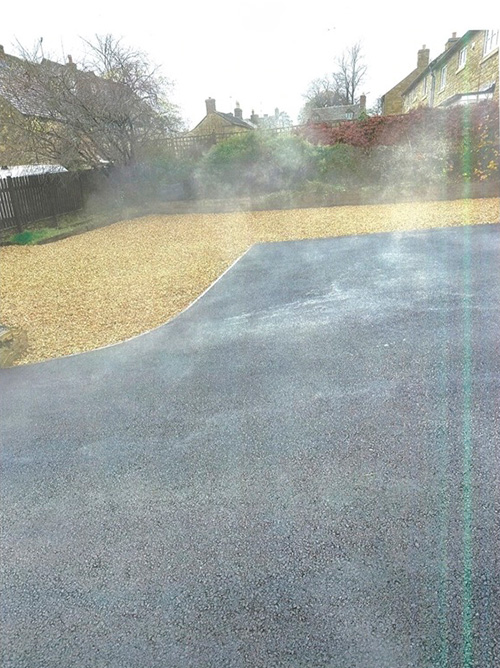 Charlbury surfacing works - lay binder course