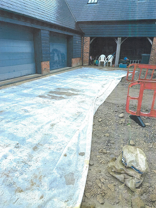 Charney Bassett driveway - installing geo-textile membrane